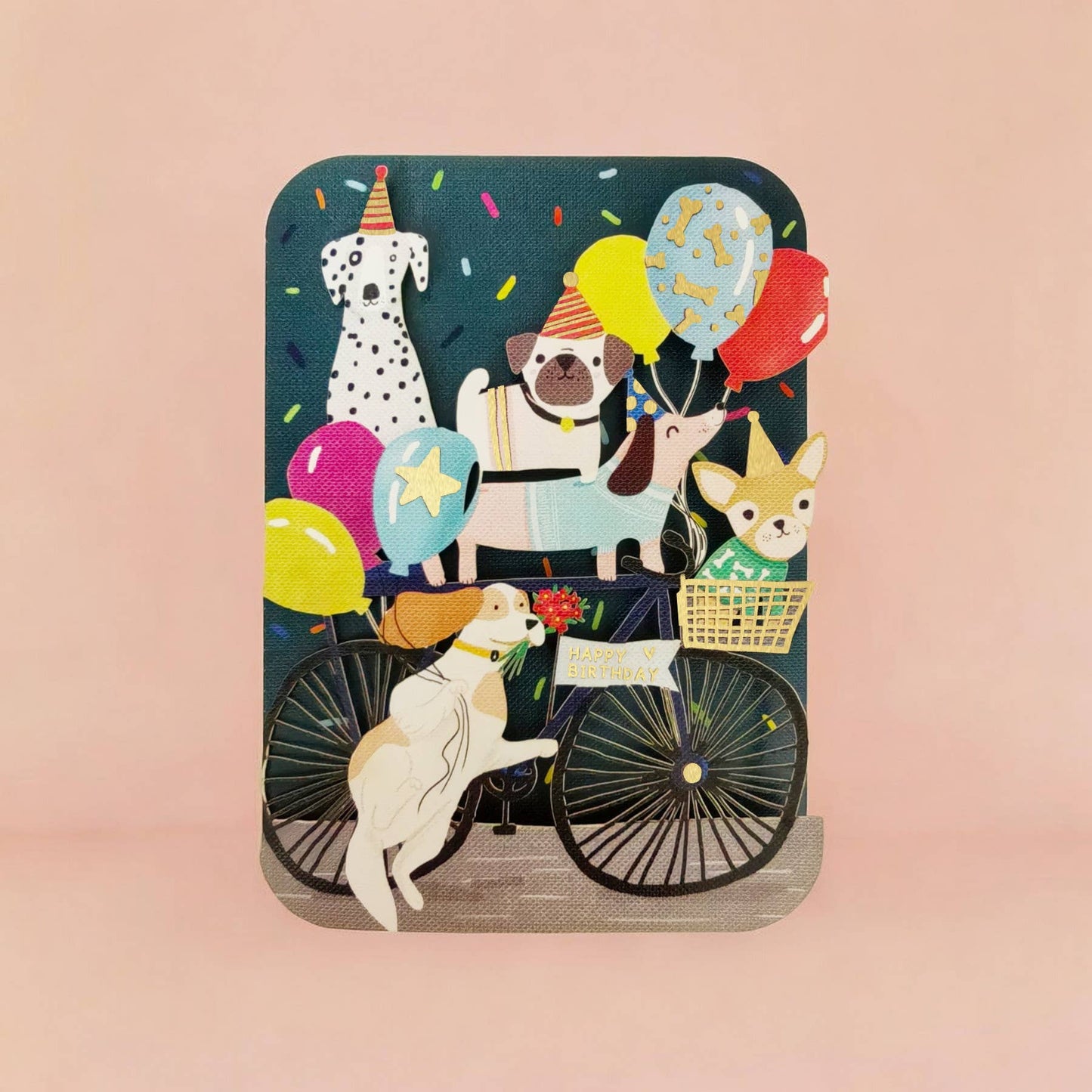 Tarjeta de cumpleaños con perros alegres en paseo en bicicleta